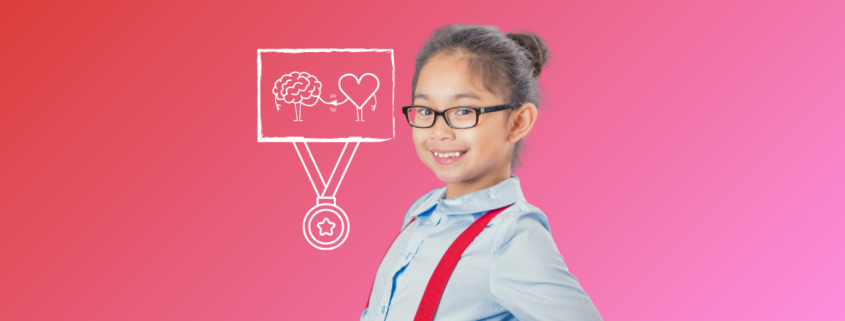 A young girl with glasses smiling when learning strategies for Positive School Experiences
